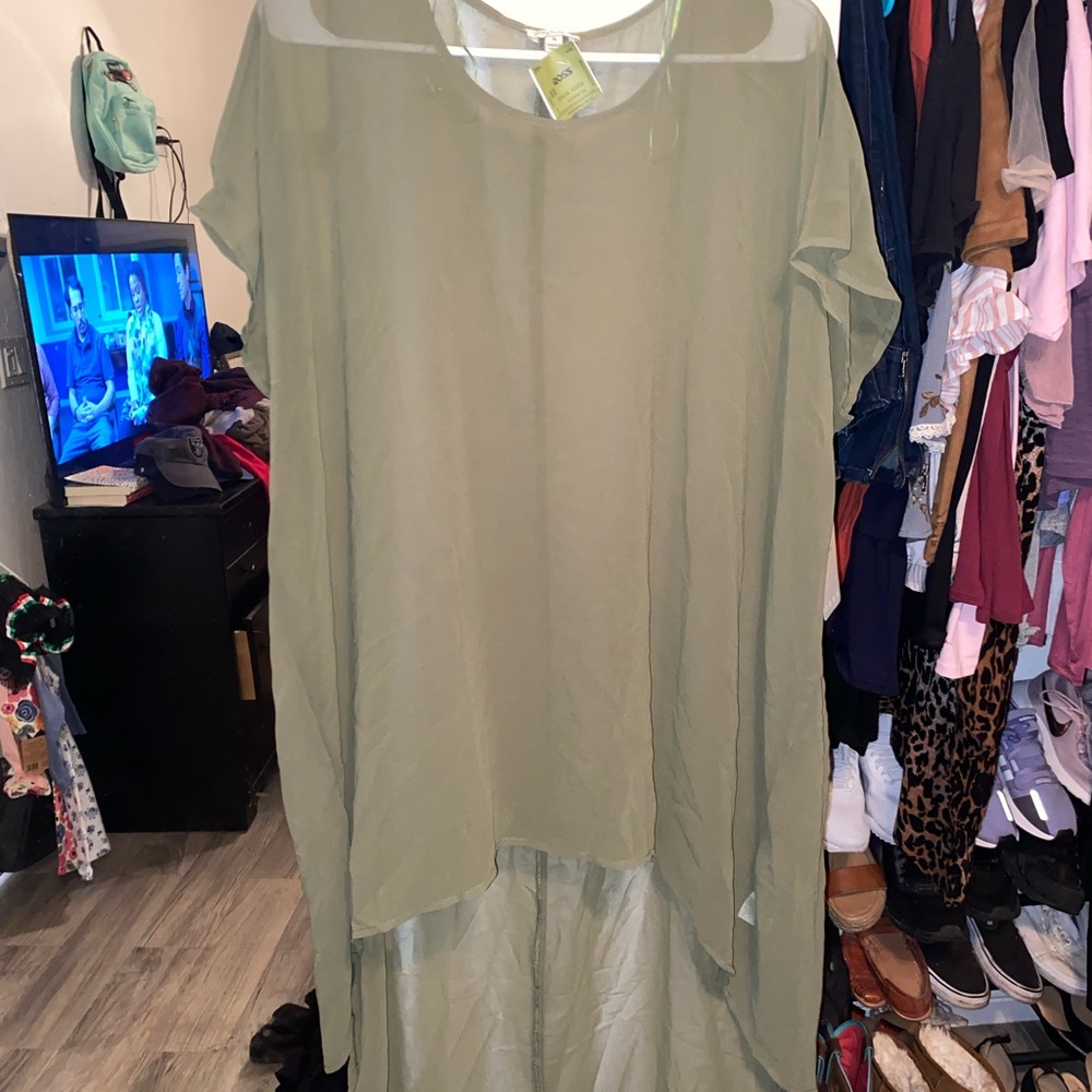 See thru green shirt w/ tail